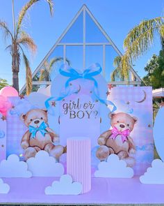 a baby shower party with teddy bears and balloons in the shape of letters that read, girl or boy?