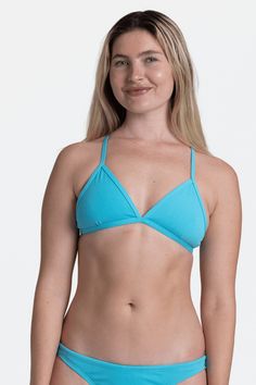 Inspired by the classic beach bikini, the Triangle swim top features tie straps to give you a perfect (and adjustable) fit and allows for top athletic performance. Features: Good for: Swim, Water Polo, Surfing, paddling, lifeguarding, ocean activities, pool activities, lifestyle Tie-back straps Lined for maximum privacy Medium coverage Medium impact Tagless for maximum comfort Chlorine proof Pill-resistant 2-way stretch Reinforced stitching Fabric Composition: Foreverever Fabric 100% Polyester E Summer Sports Bra With Strappy Back, Solid Color T-back Sports Bra For Summer, Solid T-back Sports Bra For Summer, T-back Sports Bra For Summer, Solid Color Triangle Top Swimwear For Sports, Solid Triangle Top Swimwear For Sports, Casual Strappy Back Swimwear For Beach, Casual Strappy Swimwear Bra Friendly, Sports Triangle Top Swimwear With Padded Cups