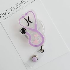 "Our badge reels are a cute gift idea for any special occasion. We carry a variety of themes to suit every profession, check our store to see our collections. All our badges are hand made using top quality FDA approve resin for that perfect glass looking finish. Each badge reel measures 2\" unless otherwise specify All badges reel will come with a matching gem, this one might be different from the one in the picture. Decorative resin art piece is permanently attached to your choice of a 360 swiv Cheap Personalized Cute Badge Reel, Cute Nurse Badge Reels, Nursing Student Badge Reel, Nurse Badge Accessories, Pink Badge Holder With Swivel Clip As Gift, Pink Badge Reel With Swivel Clip As Gift, Customizable White Badge Holders For Personal Use, Personalized Silver Badge Reel For Gift, Customizable Silver Badge Reel Gift