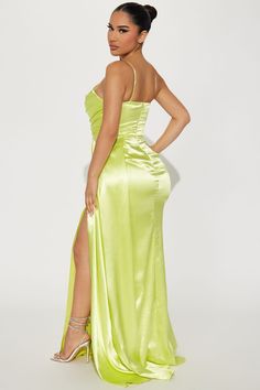 a woman in a lime green dress