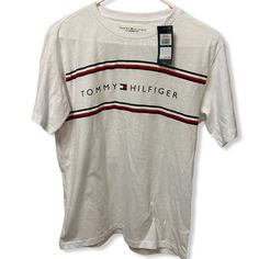 Nwt Tommy Hilfiger Boys T-Shirt Spellout Preppy Size Xl ( Boys) / Will Fit A Mens Small New With Tags Armpit To Armpit-21” Length- 27” Bundle More Children’s Clothes To Save On Already Discounted. Shipping. I Can Ship Up To 5lbs Of Clothing At Once So Feel Free To Bundle More Infant And/Or Adult Clothes To Maximize Your Shipping . Aa13-3/23/8oz Tommy Hilfiger Cotton Tops With Logo Print, Tommy Hilfiger Graphic Print Short Sleeve Shirt, Tommy Hilfiger Cotton Shirt With Graphic Print, Tommy Hilfiger White Crew Neck Top, Tommy Hilfiger Cotton Graphic Print Shirt, White Cotton Tommy Hilfiger T-shirt, Tommy Hilfiger Graphic Print Cotton Shirt, Tommy Hilfiger Cotton T-shirt For Summer, Tommy Hilfiger Short Sleeve T-shirt For Summer