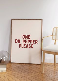 a poster with the words one dr pepper please next to a chair