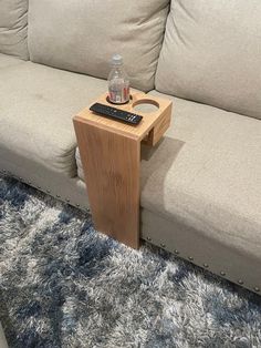 "This solid oak drink caddy works great for couches and sectional couches that do not offer a drink holder. Simply slide the caddy under the couch and it stands by itself. Fits all couches that are under 22 inches tall. Comes in a variety of stain colors and finished with a Lacquer to help protect from scratches and some water damage. Holes are 3.5\" wide so almost all drinking cups and bottles will fit. No Returns on this product due to a customized finish for your order." Couch Drink Table, Wooden Couch Cup Holder, Cup Holder For Couch, Couch Drink Holder Diy, Side Table For Sectional Couch, Couch Drink Holder, Diy Cup Holder For Couch, Wooden Remote Holder, Sofa Cup Holder