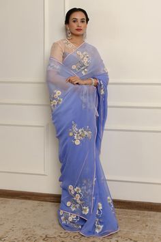 Blue ombre saree featuring floral embroidery in Swarovski crystals and thread work. Comes with an unstitched blouse piece. - Aza Fashions Traditional Blue Pre-draped Saree With Floral Embroidery, Blue Silk Pre-draped Saree With Floral Embroidery, Blue Pre-draped Saree With Chikankari Embroidery, Blue Georgette Saree With Floral Embroidery, Blue Semi-stitched Pre-draped Saree With Chikankari Embroidery, Blue Unstitched Pre-draped Saree With Chikankari Embroidery, Elegant Blue Saree With Chikankari Embroidery, Blue Silk Saree With Floral Embroidery, Blue Chikankari Embroidery Pre-draped Saree