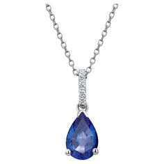 Fourteen karats white gold sapphire and diamond necklace pendant Trending style of layers on layers of gold chains to chunky, retro pendants paired with dainty chokers, layering your necklaces has become an art Necklace measuring 16 inches long Diamond bail hanging pendant 0.35" long with pear shaped sapphire drop Pear Shaped blue sapphire weighing 1.15 carats Sapphire is of royal blue hue Diamond bail weighing 0.10 carats Oval cable chain necklace with spring lock New Necklace Handmade in the U Trending Necklace, Diamond Necklace Pendant, Purple Pendant Necklace, Art Deco Pendant Necklace, Necklace Drawing, Black Pendant Necklace, Blue Pendant Necklace, Ruby Necklace Pendant, Sapphire Necklace Pendants