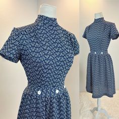 "1960s Dress / 60s Mod Dress / 1960s Mod dress / 60s dress This is a 1960s Mod style dress. It has a blue and cream print,a fitted waist with decorative buttons and a center back zipper. I love the hidden pleats in the front shoulders that give her an even more tailored look. Measurements provided are flat and have been doubled. Vintage size 12. Makers tag reads Kenny Classics Bust 36\" Waist 26\" Hips 50\"   Length 38\" Shoulder 15\" ❤️ Condition: Excellent vintage condition. This item has been Chic Fitted Dress With Retro Print, Fitted Short Sleeve Dress With Vintage Pattern, Fitted Dress With Vintage Pattern And Short Sleeves, Fitted Dress With Short Sleeves And Vintage Pattern, Blue Retro Dress With Retro Print, Fitted Blue Dress With Retro Print, Fitted Retro Print Dress For Vintage Occasions, Fitted Retro Vintage Dress With Vintage Print, Mid-century Fitted Dress With Vintage Print