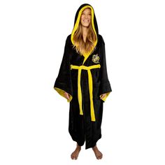 PRICES MAY VARY. Harry Potter Style: Straight from the Wizarding World of Harry Potter is this magical Hufflepuff Bathrobe. Show off your Hogwarts house pride with this plush robe, designed to look like a comfy wizard-inspired garment. Magical Design: Specially crafted for wizards and muggles alike, this Harry Potter bathrobe is both cozy and fashionable. The plush robe is black and contrasted with a yellow trim. Features an embroidered Hufflepuff house crest on the chest. Quality Construction: Wizarding Robes, Gryffindor Pride, Wizard Robes, Hufflepuff House, Plush Robe, Harry Potter Style, Harry Potter Hufflepuff, Wizarding World Of Harry Potter, Sleepwear Robe