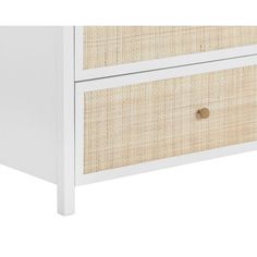 a white and wicker dresser with two drawers on one side, the drawer is closed