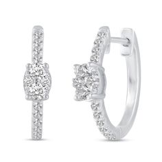 Dress up your ears in sophisticated detail when you wear these oval-shaped multi-diamond huggie hoop earrings in white gold. Created in 14K white gold Each earring showcases an oval-shaped composite of sparkling diamonds. The diamond-lined hoop provides a sparkling back drop. Radiant with 1/2 ct. t.w. of diamonds These earrings secure with hinged backs. Oval Diamond White Hoop Earrings Fine Jewelry, Diamond White Oval Hoop Earrings With Diamond Accents, Diamond Oval Huggie Earrings Fine Jewelry, Oval Diamond Huggie Earrings Fine Jewelry, Oval Hoop Earrings With Diamond Accents In Diamond White, Fine Jewelry Oval Huggie Earrings With Prong Setting, White Oval Hoop Earrings With Prong Setting, Oval Diamond Huggie Earrings For Anniversary, Oval Huggie Earrings Fine Jewelry