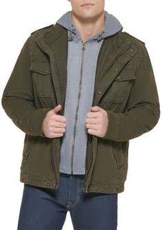 In a washed cotton canvas, this jacket by Levi's features a jersey knit hood and a sherpa lining for a warm, comfortable feel. | Levi's Men's Military Trucker Jacket, X-Large Levi's Cotton Hooded Outerwear, Levi's Hooded Cotton Outerwear, Levi's Hooded Outerwear For Cold Weather, Hooded Cotton Utility Jacket For Cold Weather, Hooded Cotton Parka With Fleece Lining, Cotton Hooded Utility Jacket For Cold Weather, Winter Cotton Parka With Double-lined Hood, Levi's Urban Winter Outerwear, Military Style Cotton Hooded Jacket For Cold Weather