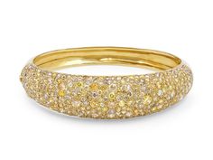 A sparkling 18K yellow gold bangle bracelet set with yellow, pink, cognac, and white diamonds of approximately 14 total carats. Metal: 18K Yellow Gold Gemstone: Colored Diamonds: ~14.0 carats Diamond Bangle Bracelet, Yellow Gold Bangle, Bangle Bracelet Set, Diamond Bangles Bracelet, Gold Bangle Bracelet, Gold Bangle, Diamond Bangle, White Diamonds, Gold Bangles