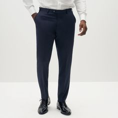 Sharp & Classic. Our flat front navy blue pants are the perfect pair. A more subtle alternative to the classic black, clean cut and transitional, pair these with our navy blue jacket to complete your look. Blue Pants For Men, Blue Suit Vest, Navy Groomsmen Suits, Mens White Dress Shirt, Dark Blue Suit, Blue Suit Jacket, Classic White Dress, Black Oxford Shoes, Navy Blue Dress Pants