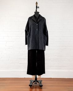 Our Boiled Wool Car Coat is a warm but lightweight layer for when the temperatures begin to drop! Its boxy shape allows for a generous fit perfect to wear over layers. Constructed from beautiful 100% boiled wool sourced from Japan, with a collar to turn up or down, and two large patch pockets. 100% Boiled Wool. Made in U.S.A. All of our wool pieces have been cold water washed on "delicate" cycle in cold water, and tumble dried on "delicate" cycle. For care please do the same, making sure you use Wool Car Coat, Jewelry Candles, Car Coat, Boiled Wool, Turn Up, New Arrival Dress, Summer Sale, Cold Weather, Cold Water