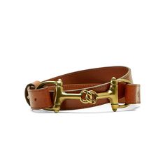 Say hello to your new favorite belt. The supple, full-grain leather silhouette has a sophisticated snaffle bit detail that elevates everything from denim to dresses—and makes a splash pared with your breeches on show day. Tack Room Belt | Product Features : 0 : Equestrian buckle design|1\ wide | Women's Tack Room Belt in Tan Leather, Size: Large by Ariat Leather Belts With Brass Hardware For Work, Leather Workwear Belts With Brass Hardware, Elegant Workwear Belts With Brass Hardware, Formal Belts With Brass Hardware, Classic Leather Belt With Brass Hardware, Classic Belt Buckles For Workwear, Classic Adjustable Belt Buckles For Workwear, Classic Bridle Leather Belt With Brass Hardware, Chic Formal Belts With Brass Hardware