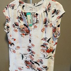 I Started Stitch Fix And Unfortunately This Blouse Just Doesn’t Fit My Personal Style. It Is Beautiful In Person, Vibrant Floral Patterns Pop Off The White Background. Loose Fit And Light Fabric That Could Be Dressed Up For Work Or A Casual Night Out With Sneakers And Jacket. I Included The Style Cards Stitch Fix Provided On How To Wear It. Let Me Know If You Have Any Questions! Printed Summer Office Tops, White Floral Print Office Blouse, Sleeveless Blouse For Office In Spring, White Floral Print Blouse For Office, Printed Tops For Office In Summer, Printed Short Sleeve Blouse For Work, Floral Print Short Sleeve Blouse For Office, Office Floral Print Short Sleeve Blouse, Casual Floral Print Blouse For Office