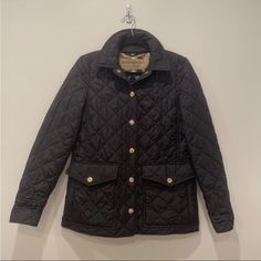 Burberry Black Jacket Nova Check Lined. Snaps Closure And Two Pockets In Front. Excellent Condition! Black Quilted Jacket, Burberry Black, Burberry Jacket, Burberry Women, Black Quilt, Quilted Jacket, Black Jacket, Coats Jackets Women, Women's Jacket