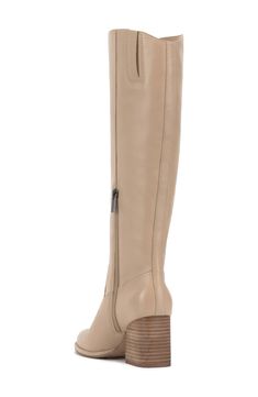 Smooth, polished leather forms the upper of this knee-high boot set atop a slightly curved block heel. 2 3/4" heel 15 1/4" shaft; 14 1/2" regular calf circumference 15 1/4" shaft; 16" wide calf circumference 15 1/4" shaft; 17" extra-wide calf circumference Leather upper/synthetic lining/rubber sole Imported Medium Width Leather Knee-high Boots, Leather Knee-high Boots With Stacked Heel, Wide Calf Leather Knee-high Boots, Wide Calf Leather Knee-length Heeled Boots, Wide Calf Knee-length Leather Heeled Boots, Leather Knee-length Wide Calf Heeled Boots, Leather Knee-high Heeled Boots With Stacked Heel, Knee-high Leather Boots With Stacked Heel, Tall Leather Knee-high Boots