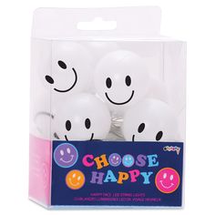 four white balloons with smiley faces on them in a package for halloween party favors or decorations