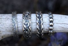 This listing is for ONE sterling silver stacking band. This thick sterling silver band features a beautiful and deeply engraved filigree pattern. Wear it alone or with other stacking rings. I love wearing my stacking set on my thumb to compliment other beautiful rings on my other fingers. The combinations are endless. Want the whole set? Buy it here: https://www.etsy.com/listing/493597787/sterling-silver-stacking-rings-sterling?ref=shop_home_active_1 -Choose your size at checkout! - Ring measure Silver Rings With Unique Variations For Anniversary, Silver Rings With Unique Designs For Anniversary, Silver Stamped Jewelry With Round Band, Stamped Silver Round Band Jewelry, Silver Stackable Jewelry, Silver Stackable Rings, Sterling Silver Stackable Rings, Silver Mens Ring, Silver Ring Band