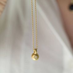 This handmade 18k gold pendant in dome design has 2 mm high quality diamond  set in its center within a small star. The pendant is hanging on solid 14k gold rolo chain 1.2 m"m, 17.7" length as shown in the picture. You can find other chain option here:   https://etsy.me/3rwP7J0 http://etsy.me/3qetMSb DETAILS: pendant diameter 0.6 cm  0.24" height: 0.6 cm 0.24" length 1 cm 0.39" Diamond 0.03 ct, 2 mm 0.08" 14k gold rolo chain 17.7" * Necklace arrives in a luxurious, high quality black leather gift box * All my jewelry is sent to you with high priority, express shipping See more necklaces in my shop: https://etsy.me/2TlEyGB Back to my shop: https://etsy.me/2Pgyxga *Warm words from a satisfied customer:* Nomi I love the necklace I will be wearing your pieces forever :) Thank you for stopping Capsule Jewelry, Solid Gold Bangle, Gold Necklace Chain, Contemporary Fine Jewelry, Sophisticated Fashion, Necklace Ideas, Gold Pendant Jewelry, Solid Gold Necklace, Twin Mom