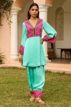 Sea green kurta featuring embroidered with beadwork, zardozi, cutdana work on the front yoke. Paired with an embroidered hem salwar. Comes with a sheer ombre dupatta featuring butterfly motifs and beadwork. - Aza Fashions Festive Turquoise Embroidered Sets, Bollywood Style Embroidered Turquoise Sets, Embellished Green Salwar Kameez For Eid, Embellished Green Palazzo Set For Eid, Green Embellished Sets For Eid, Festive Embroidered Turquoise Sets, Green Palazzo Set With Embroidered Border For Navratri, Green Embroidered Palazzo Set For Navratri, Traditional Embellished Green Palazzo Set