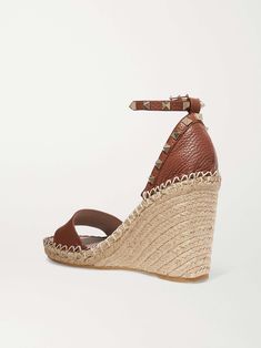 VALENTINO GARAVANI Rockstud 105 textured-leather espadrille wedge sandals Leather Espadrilles With Heel Strap, Leather Wedge Sandals With Woven Sole For Vacation, Leather Heels With Woven Sole For Vacation, Leather Espadrilles With Heel Strap For Vacation, Luxury Summer Wedge Sandals With Woven Sole, Luxury Heel Strap Sandals For Vacation, Luxury Heels With Heel Strap For Vacation, Luxury Vacation Heels With Heel Strap, Luxury Heels For Spring Vacation