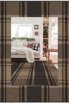 a living room filled with furniture and a plaid rug