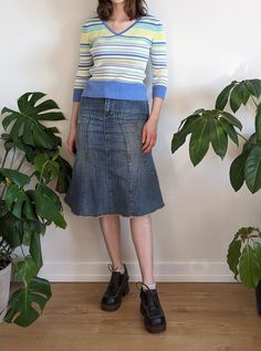 "The cutest Y2K denim midi skirt. Panelled skirt with wide zig-zag stitching over seams. Rhinestone & embroidered swirly back yoke detail. Has belt loops, front & back pockets and a front button & zipper closure. Made early 2000s by Smart Set. Perfect condition. Tag size- 5 (medium) Waist- 30\" Hip- 35\"- 37\" Length- 25\" Fabric content- cotton, spandex" Midi Jean Skirt Outfits, White Cornflower, Midi Jeans Skirt, Midi Rock Outfit, Midi Skirt Y2k, Jean Midi Skirt, Denim Rhinestone, Panelled Skirt, Jean Skirt Outfits