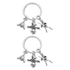 two key chains with charms attached to them