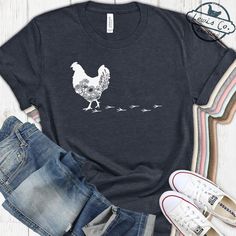 Find More Chicken Shirts in my 🐔 🐥 Chicken Life Section: https://lewiscotrading.etsy.com/?section_id=37763572 🐥🐔 These are Bella Canvas shirts. They are Unisex but tend to run a 1/4 to a half size small. If you like them extra roomy, please order 1 size up! 👕 SIZE CHARTS 👕 Size charts are included in the item photos. Please check them out for specific sizing details, and feel free to message me with any questions before ordering. I can help you choose the right size or even give you a quot Farm Shirts For Women, Potters Hands, Farm Shirts, Floral Chicken, Chicken Mama, Fall Tees, Chicken Life, Chicken Shirt, Copper Coin