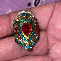 Such A Gorgeous Ring With All Those Colors. Size 7. Rhinestones. Multicolor Jeweled Ring, Vintage Multicolor Rings For Party, Oval Shaped Rhinestone Jewelry For Gifts, Oval Rhinestone Jewelry Gift, Multicolor Party Ring Jewelry, Multicolor Metal Bohemian Rings, Bohemian Multicolor Metal Rings, Multicolor Crystal Rings For Party, Blue Jeweled Rings For Gifts