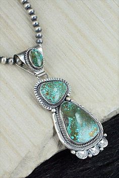 Western Style Collectible Turquoise Sterling Silver Necklace, Western Style Turquoise Pendant Necklace In Sterling Silver, Sterling Silver Turquoise Necklace With Patina, Western-style Sterling Silver Turquoise Pendant Necklace, Western Sterling Silver Turquoise Pendant Necklace, Southwestern Silver Necklace With Patina, Southwestern Silver Turquoise Necklace With Patina, Collectible Sterling Silver Turquoise Necklace With Patina, Southwestern Sterling Silver Turquoise Necklace Collectible