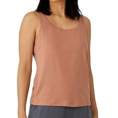 Size Info: Oversized By Design; If Ordering Eileen Fisher For The First Time, Order One Size Down. M=10-12 Details: A Simple Tank Designed To Help You Breeze Easily Through Your Busy Day Is Cut From A Comfy, Sustainably Produced Stretch Knit. 22 1/2" Length (Size Medium) Scoop Neck 93% Tencel Lyocell, 7% Elastane Tencel Lyocell Is A Sustainably Produced Fiber Made With Closed-Loop Processing Machine Wash, Tumble Dry Made In The Usa Of Imported Fabric New Without Tags. Summer Scoop Neck Top For Relaxation, Spring Relaxation Tank Top, Tank Design, Busy Day, Eileen Fisher, First Time, Scoop Neck, Womens Tops, Size Medium