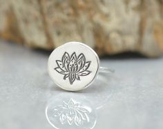 Sterling silver lotus flower ring Artisan handmade  Rustic style Charm:15 mm 14 gauge sterling silver half round band -Please choose your size at check-out --Please check shipping options before you order-- All metals used: 925 sterling silver, 999 fine silver, 14K gold All gemstones are semiprecious All of my jewelry comes nicely packaged I am open to making custom pieces Please click here to visit shop: https://www.etsy.com/shop/NatureJourney Thank you for visiting! Lotus Flower Ring, Women Flower, Style Rustique, Handmade Rings, Flower Ring, Handmade Artisan, Lotus Flower, Fine Silver, Rings Statement