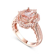 Add a touch of luxury to any look with this gorgeous morganite ring. The ring feature an intricate vintage-inspired design with a shimmering stones set a halo surrounds this magnificent cushion-cut morganite with exceptional sparkle. Adore your loved one with this unique morganite ring.Carat Weight: 1.46 ctStone Size: 6*8 mmNumber of Stones: 1 Stone Shape: RadiantStone Color: Fancy PinkCarat Weight: 0.727 ctStone Size: 1.5,1.3,1.1,0.9 mmNumber of Stones: 70 Stone Shape: RoundStone Color: Diamond WhiteWeight: 5.74 gWidth: 3.3 mmHeight: 8.3 mmThickness: 1.4 mmMaterial: 925 SilverPlating Color: Rose Gold Elegant Rose Gold Topaz Ring With Accent Stones, Rose Gold Cushion Cut Morganite Ring, Elegant Morganite Cushion Cut Rings, Elegant Radiant Cut Morganite Rings, Elegant Morganite Radiant Cut Rings, Rose Gold Topaz Ring With Halo Setting, Elegant Pink Cluster Ring With Halo Setting, Rose Gold Cushion Cut Ring With Accent Stones, Formal Rose Gold Topaz Ring With Halo Setting