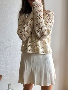 Crochet sweater completely handmade in 100% cotton. This lace sweater has the perfect boho pattern! You can wear it the whole year. The knit crochet sweater is available in different colors and sizes. WHICH IS MY SIZE? In order to know which is the perfect size for you, you just have to measure your chest . Below, you can find the measurements referred to every size: Measurements referring to the chest contour: Size XS: 76cm / 30 in. Size S: 80 cm / 32 in. Size M: 90 cm / 35 in. Size L: 100 cm / Knit Crochet Sweater, Pastel Sweater, Loose Knit Sweater, Distressed Sweater, Mesh Sweater, Pull Crochet, Sheer Sweater, Handmade Sweater, Distressed Sweaters