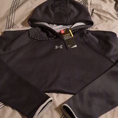 Women's Pullover Hoodie Capped Strings Linked Pocket Water Repellent Measurements: Armpit To Armpit - 22 Inches Armpit To Bottom - 18 Inches Armpit To Sleeve Cuff - 22 Inches Brand New-- Still With Tags Gray Hoodie With Ribbed Cuffs For Outdoor Activities, Gray Sweatshirt With Ribbed Cuffs For Cold Weather, Under Armour Hoodie For Winter Sports, Under Armour Sports Hoodie For Winter, Gray Sweatshirt With Ribbed Cuffs For Outdoor Activities, Gray Sweatshirt With Ribbed Cuffs For Outdoor, Under Armour Winter Outdoor Hoodie, Under Armour Winter Sports Hoodie, Under Armour Winter Sports Sweatshirt