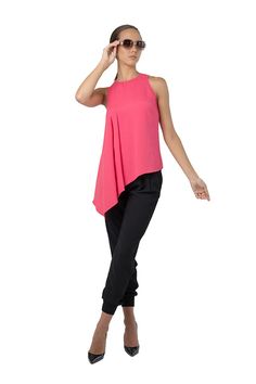 Shop this beautiful top in charming pink color. Perfect for everyday use, you could pair it with a stylish pair of jeans or trousers to complete a sophisticated look. The asymmetrical front gently cascading into a drape, the slightly shaped waist, and relaxed hem will beautifully accentuate your curves and give you you an unparalleled feminine charm. Round Neck Cascade Asymmetrical Front 100% Viscose Crepe Satin Back Made in NYC SIZE & FIT 25'' From shoulder to shortest length at the hem Mod Asymmetrical Hem Top, Asymmetrical Cut, Elegant Blouse Designs, Women Design, Crepe Top, Trendy Fashion Tops, Daily Style, Type 4, Crepe Fabric