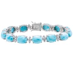 Showcasing a stunning combination of cabochon oval-cut, prong-set larimar gemstones and sparkling round-cut, prong-set white zircon, this bracelet is a testament to timeless style and sophistication. From Affinity Gems. Elegant Larimar Jewelry For Formal Events, Elegant Larimar Bracelet Jewelry, Elegant Larimar Jewelry, Elegant Turquoise Larimar Bracelets, Bracelet Sterling Silver, Tennis Bracelet, Oval Cut, Sterling Silver Bracelets, Timeless Style