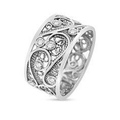 a white gold ring with diamonds in the center and an intricate design on the side