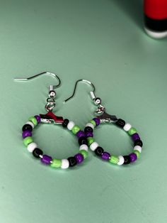 Beetlejuice inspired beaded hoops Beaded Beetle Juice Earrings, Beetle Juice Earrings, Handmade Casual Halloween Jewelry, Casual Handmade Halloween Jewelry, Casual Handmade Jewelry For Halloween, Beetlejuice Crafts Diy, Beetlejuice Jewelry, Beetlejuice Earrings, Beetlejuice Diy