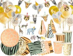 an assortment of animal themed party supplies including zebras, giraffes and balloons