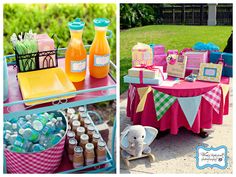 an outdoor party with pink and blue decorations, food and drinks on a table in the backyard