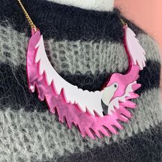 Flamingo 🦩 collar is a fun, quirky statement piece to pair with any outfit. You can choose from two perspex finishes.  The necklace is made from our fabulous pink mirrored or Matte perspex. It has a shimmer pink acrylic layered on top and is linked to a curb chain with a standard necklace clasp.  If you have any questions drop us a line! 💌We are more than happy to help 😁 To clean your necklace you can simply wipe with a glasses cloth or soft cloth to remove finger marks. Acrylic is a fragile material so please store in a jewellery box to prevent damage.  As ever for safety please keep away from small children. Novelty Party Jewelry Made Of Plastic, Novelty Plastic Party Jewelry, Fun Plastic Jewelry For Party, Fun Plastic Party Jewelry, Pink Plastic Party Necklace, Trendy Resin Necklaces For Party, Pink Plastic Necklaces As Gifts, Pink Plastic Necklace For Gift, Pink Plastic Necklace Gift