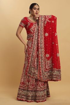 Red can can attached lehenga featuring thread embroidered floral swirl motifs, embellished by crystal, sequin and stone. Comes with padded embellished blouse and dupatta. - Aza Fashions Traditional Red Floor-length Lehenga, Red Traditional Wear With Sheer Dupatta And Kundan, Red Gown With Dori Work For Traditional Ceremonies, Red Sharara With Sheer Dupatta For Traditional Ceremonies, Red Sharara With Intricate Embroidery, Traditional Red Floor-length Choli, Red Kundan Gown With Traditional Drape, Red Kundan Sets For Reception, Red Kundan Saree With Sheer Dupatta