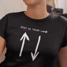 "This Stay In Your Lane T-Shirt is a perfect way to bring some humor into your day by being a little cheeky, and is a great gift for colleagues, friends and family This t-shirt is everything you've dreamed of and more. It feels soft and lightweight, with the right amount of stretch. It's comfortable and flattering for all.  * 100% combed and ring-spun cotton (Heather colors contain polyester) * Fabric weight: 4.2 oz/yd² (142 g/m²) * Pre-shrunk fabric * Side-seamed construction * Shoulder-to-shou Funny Text Print T-shirt For Everyday, Funny Graphic Print Tops For Everyday, Trendy T-shirt With Funny Text For Everyday, Trendy Funny Text T-shirt For Everyday, Trendy Everyday T-shirt With Funny Text, Funny Graphic Print T-shirt For Everyday, Funny Pre-shrunk Everyday T-shirt, Funny Short Sleeve Tops For Everyday, Funny Print T-shirt For Everyday