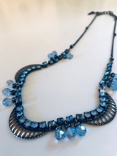 This vintage necklace is SUPER gorgeous and unique! It is pale blue and gunmetal and has a cool, gothic vibe while also being pretty darn elegant! Length: 20-21". I hope you love this as much as I do! Thank you so very much for visiting my shop!! Click here for more: http://www.etsy.com/shop/jHenSunshine New to my shop? See my policies section for any additional questions. Gothic Beaded Necklace, Vintage Gothic, Black Rhinestone, Chain Styles, Pale Blue, Vintage Necklace, I Hope You, Vintage Shops, Pearl Necklace