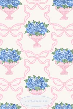 blue hydrangeas in a pink vase on a white background with ribbon and bow