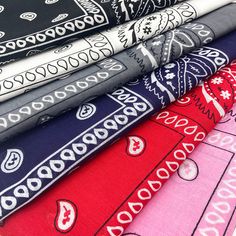 a pile of different colored bandannas sitting on top of each other