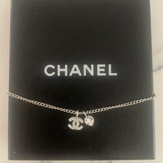 Chanel Mini Heart Crystal Necklace Great Condition Purchased In 2006 And Never Worn Just Kept In Box Elegant Jewelry With Logo Charm For Gift, Silver Jewelry With Logo Charm For Anniversary, Anniversary Silver Jewelry With Logo Charm, Elegant Jewelry With Logo Charm Heart Pendant, Elegant Jewelry With Heart Pendant And Logo Charm, Elegant Heart Pendant Jewelry With Logo Charm, Heart Pendant Jewelry With Logo Charm For Gifts, Heart Pendant Jewelry With Logo Charm As Gift, Silver Jewelry With Logo Charm For Gift